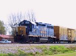 CSX 6362 leads a train towards the diamond